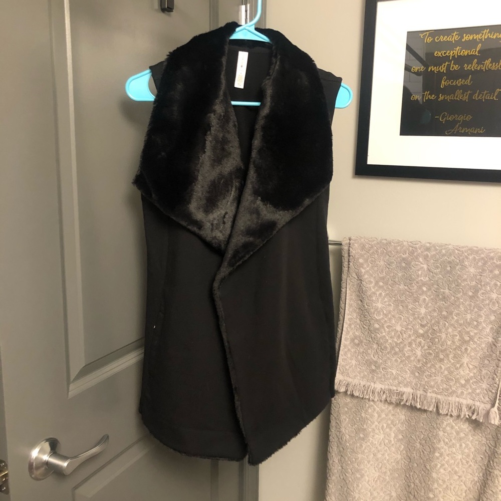 Black faux fur lined vest